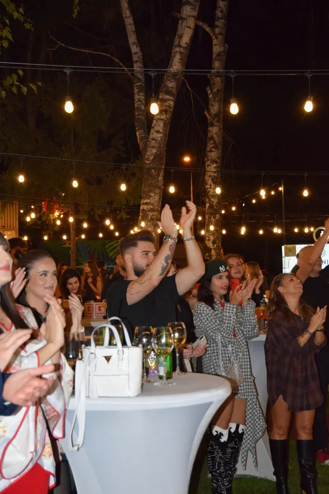 Guests celebrating together at an Elite Media United evening event